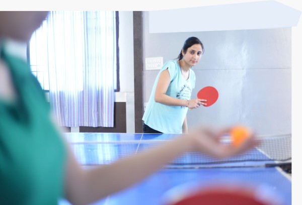 Students playing table tennis